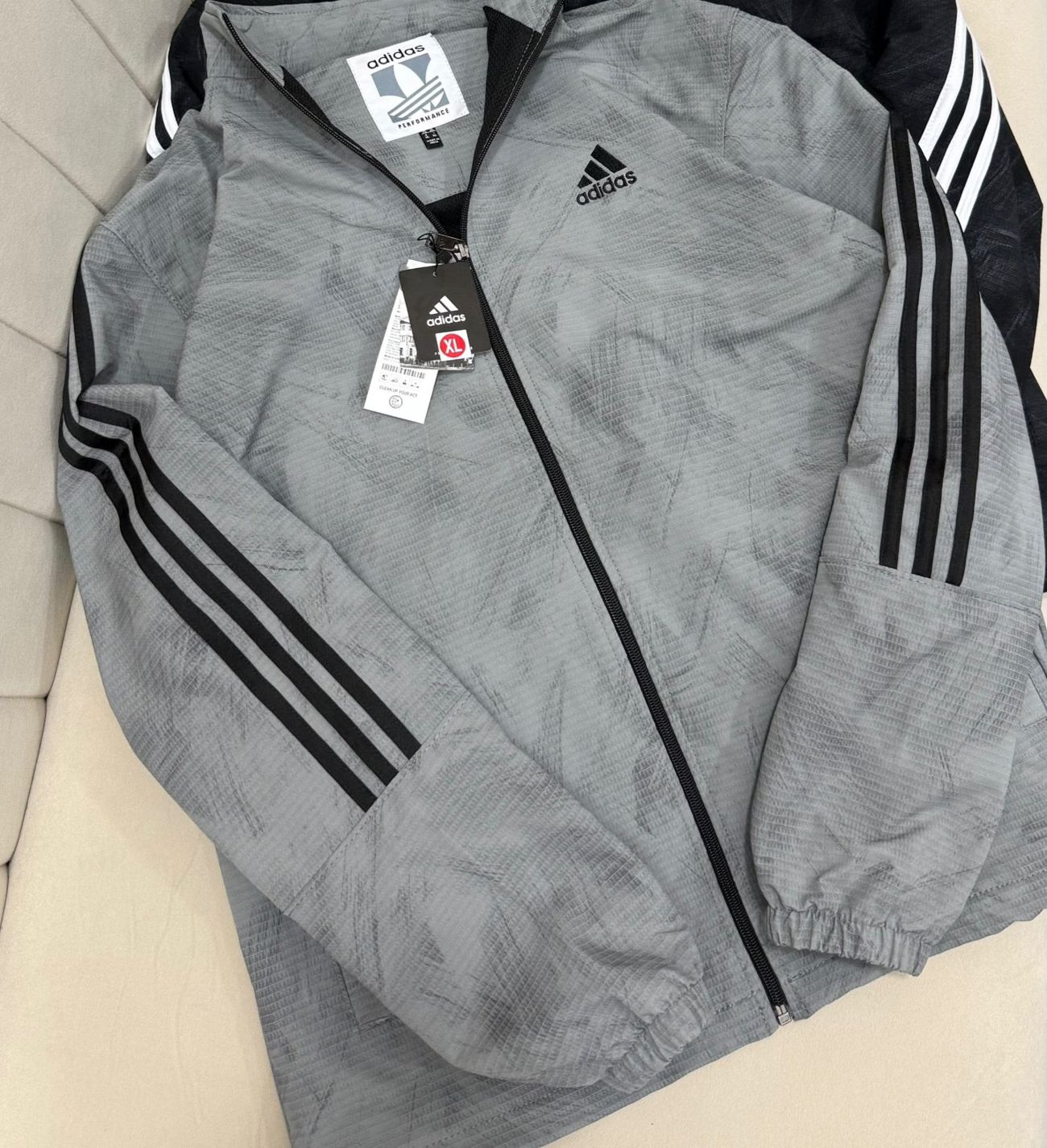 Ash grey track windbreaker with black sleeve stripes